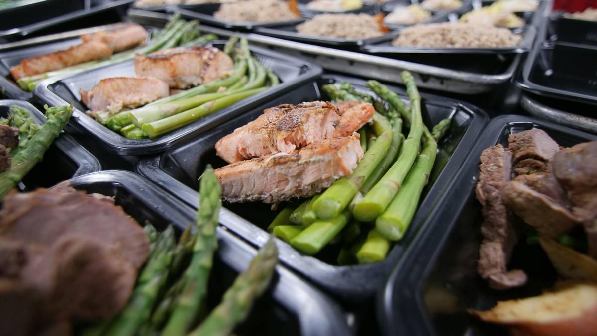 high protein batch meal prep containers with dual-protein base and vibrant vegetables