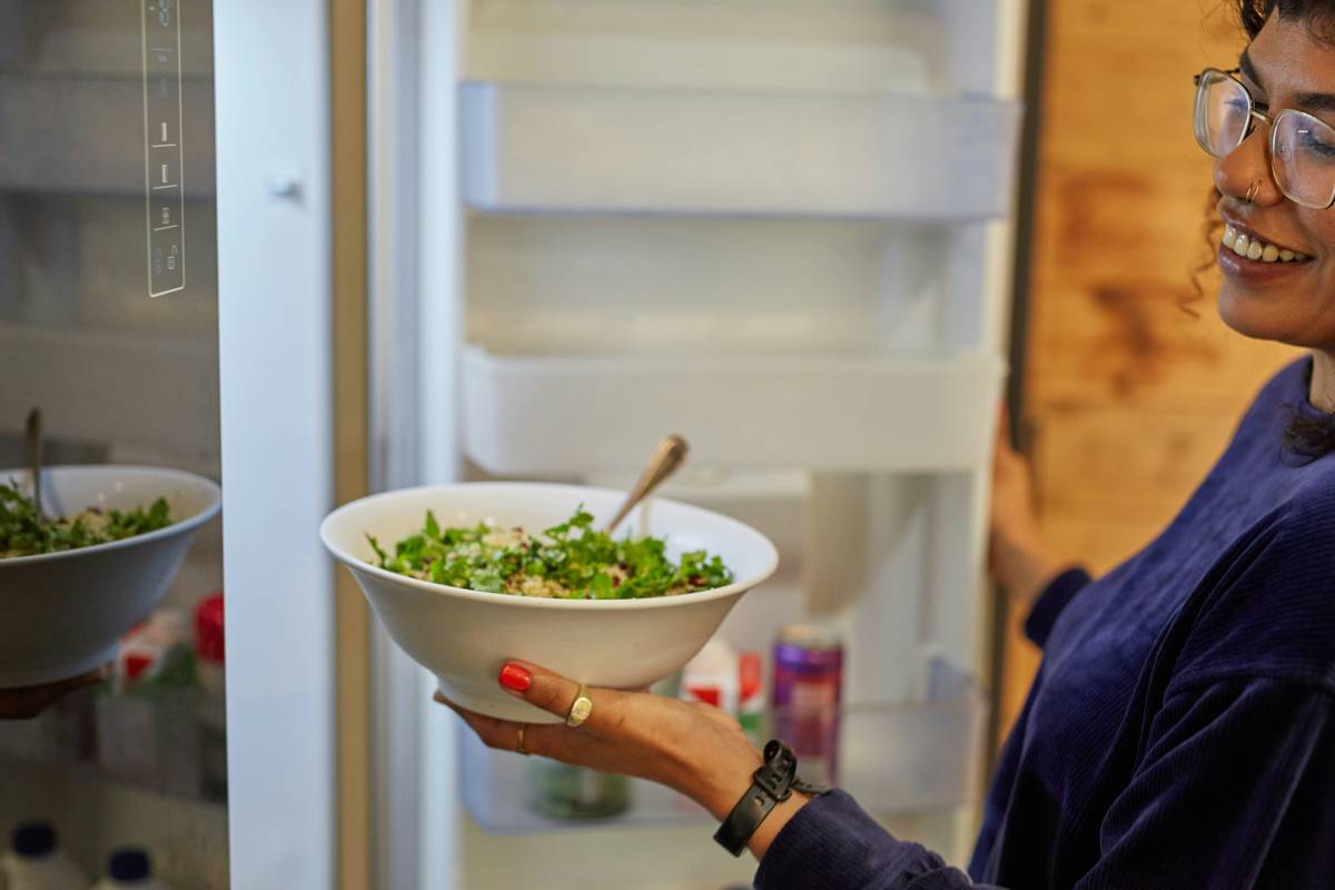 Budget friendly plan meal prep components in freezer storage bins