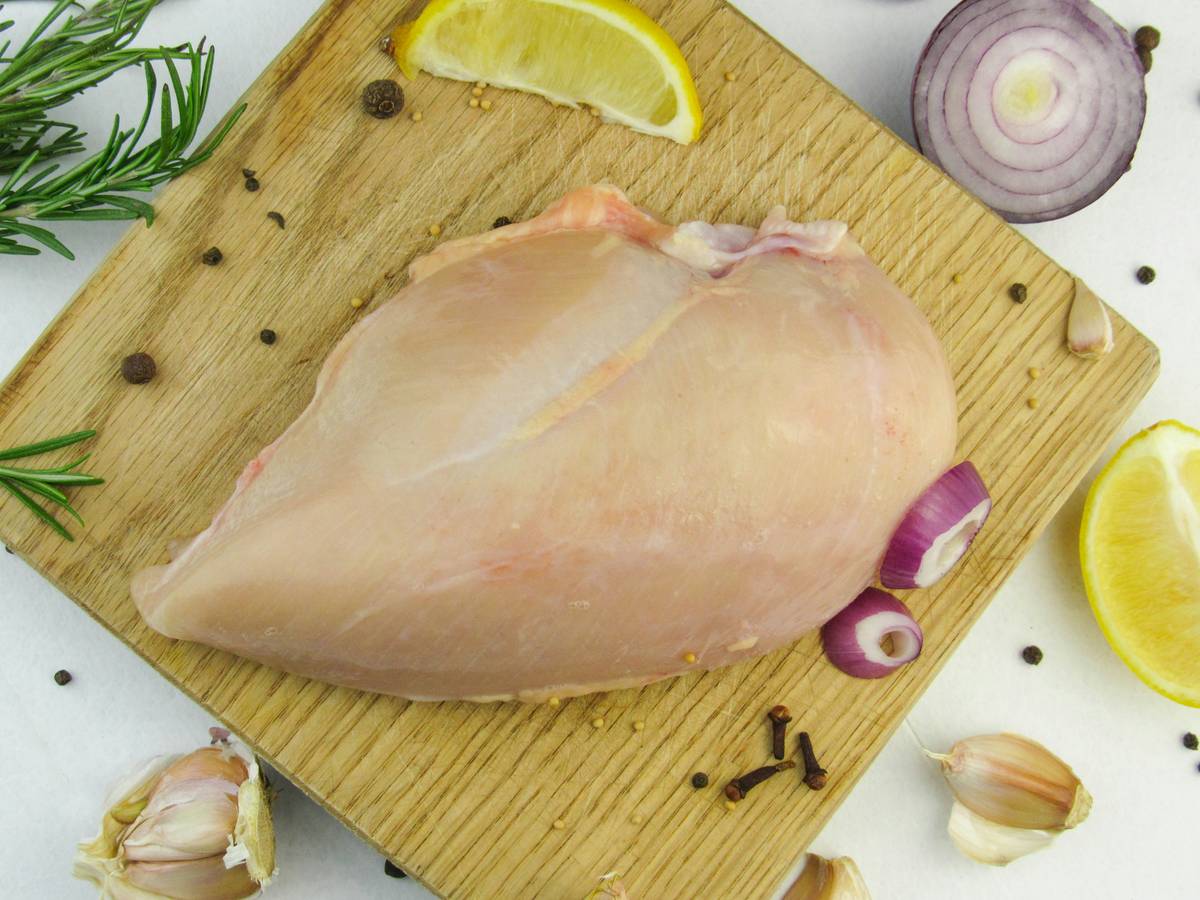 Chicken breast batch dry-brined on a tray ready for cooking